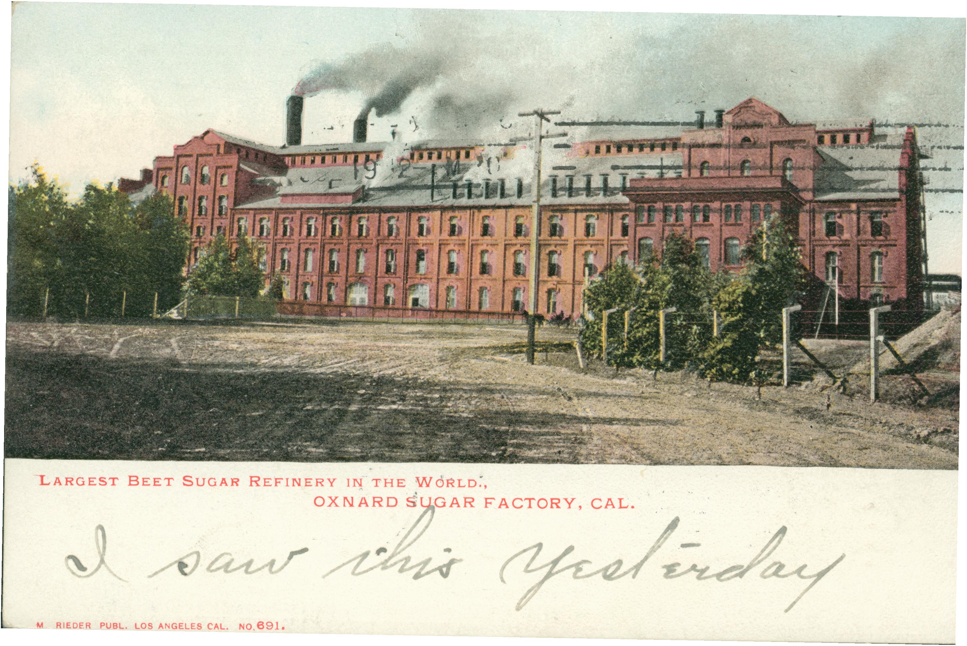Shows the exterior of the Oxnard Sugar Factory